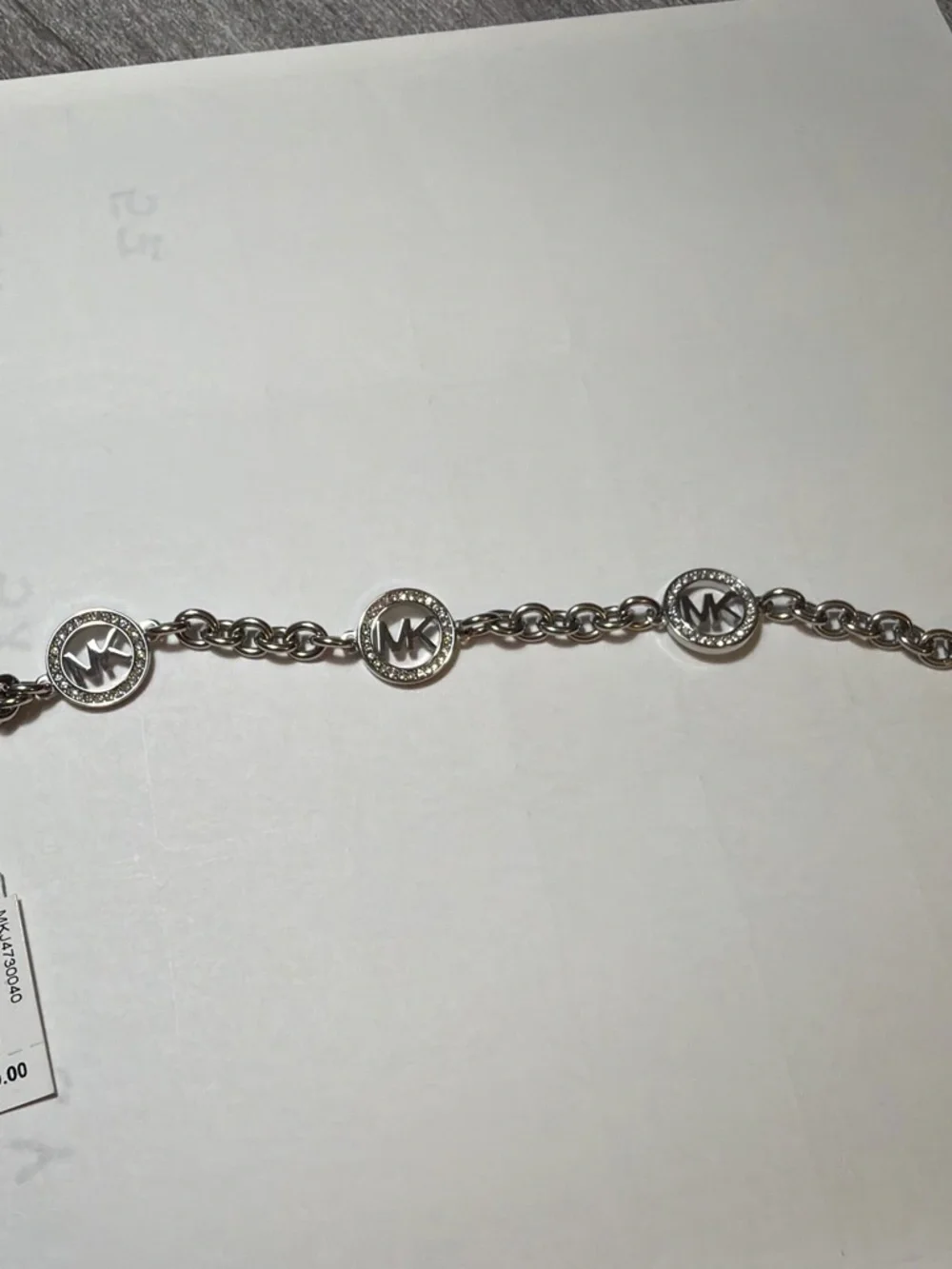 Michael Kors Silver-Tone MK Charm Chain Bracelet with Crystal Rings